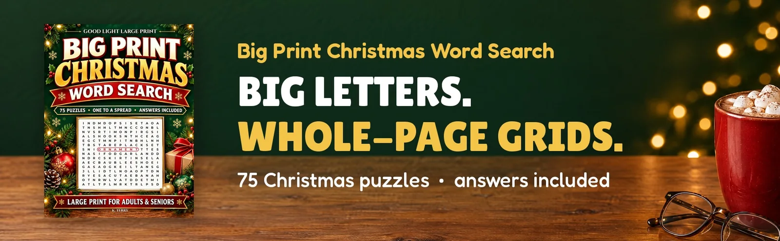 The Big Print Christmas Word Search cover on a wooden table beside cocoa and reading glasses.